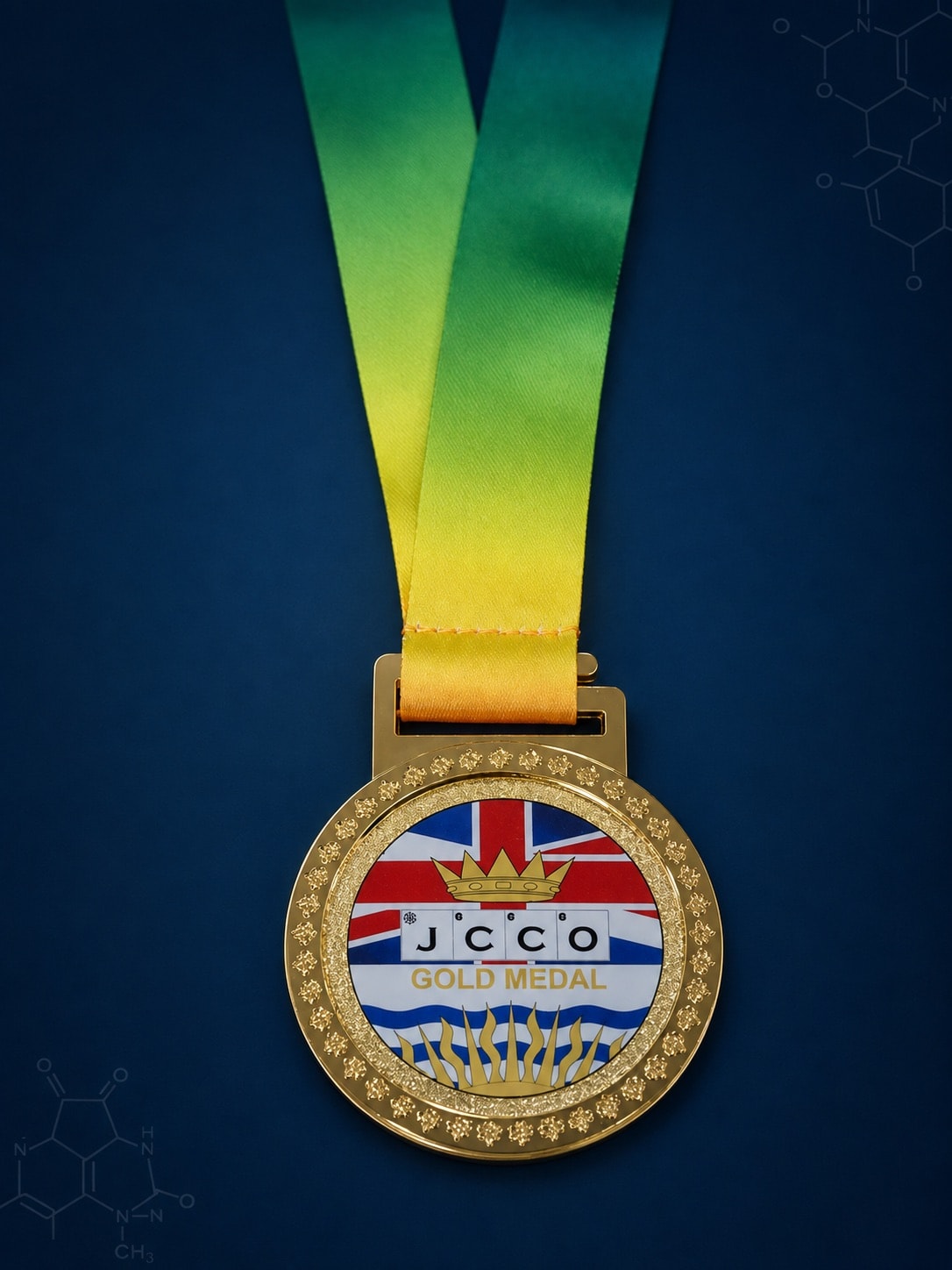 เหรียญทอง JCCO ด้านหน้าพร้อมริบบิ้น